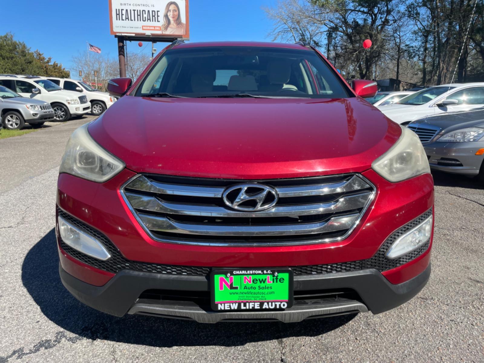 2013 RED HYUNDAI SANTA FE SPORT 2.0T (5XYZU3LA3DG) with an 2.0L engine, Automatic transmission, located at 5103 Dorchester Rd., Charleston, SC, 29418-5607, (843) 767-1122, 36.245171, -115.228050 - Leather, CD/AUX/Sat/Bluetooth, Dual Climate, Power Everything (windows, locks, seats, mirrors), Heated Seats, Rear Heated Seats, Push Button Start, Keyless Entry, Alloy Wheels. Local Trade-in!! Located at New Life Auto Sales! 2023 WINNER for Post & Courier's Charleston's Choice Pre-owned Car Dealer - Photo #1